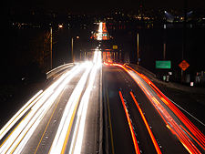 Nighttime traffic on the Evergreen Point Floating Bridge - the world's largest - looking west into Seattle.