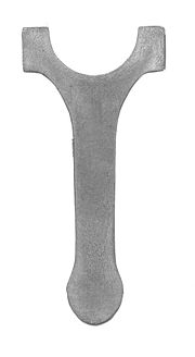 Scan of sectioned, forged connecting rod that has been etched to show grain flow.
