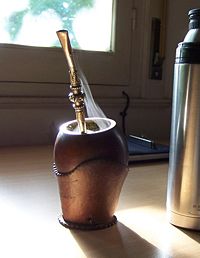 Steaming yerba mate infusion in its customary gourd.