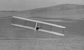Wilbur making turn Oct. 24, 1902 with the movable rudder.