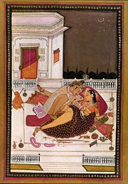 Prince and his lady on a terrace at night (India)
