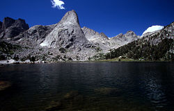Pingora Peak rises above Lonesome Lake in the Popo Agie Wilderness. Pingora is one of many peaks located in the Cirque of the Towers