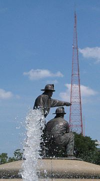 KCTV Tower on 31st Street on Union Hill in Kansas City, with the Firefighters' Memorial Fountain in the foreground.