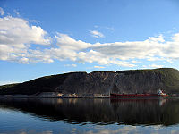 A bulk carrier in the Strait of Canso docked at the Martin Marietta Materials quarry located at Cape Porcupine. The photo is taken from Cape Breton side of the Canso Causeway.