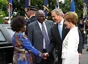 Mwai Kibaki and Mrs. Kibaki with U.S. President George W. Bush and Mrs. Laura Bush at the White House during a state visit to Washington, D.C. in 2003.