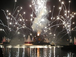 Cloud of smoke caused by black powder explosions during a fireworks display; fireworks are made with black powder.