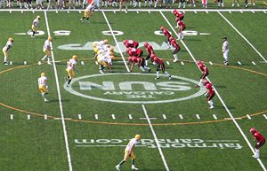 Canadian football features a wider field, fewer downs, and a 12-man team.