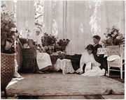 Grand Duchess Anastasia sits with her mother, Alexandra, and sister Olga in her mother's sitting room ca. 1916. Courtesy: Beinecke Library