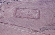 Remnants of one of several legionary camps at Masada, just outside the circumvallation wall which can be seen next to it.