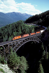 A long freight train crosses the Stoney Creek viaduct on the Canadian Pacific Railway in Southern British Columbia.