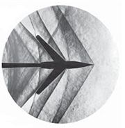 Schlieren photograph of an attached shock on a sharp-nosed supersonic body.