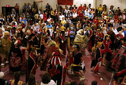 A large group dancing at a totem pole raising celebration in Klawock, Alaska, 2005
