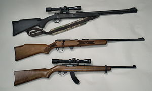 Some present-day rifles, top to bottom: Traditions .50 Cal. break-open type muzzleloader, Marlin Model 25N clip-fed bolt action .22 rimfire, Ruger Model 10/22 autoloading .22 rimfire with aftermarket extended banana-clip magazine.