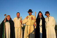Modern Druids in the early morning glow of the sun