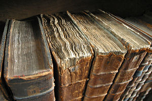 Decaying books at the library of Merton College, Oxford.