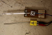 S and K type thermocouples, the S one is partially sheathed with an alundum tube.