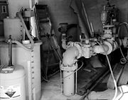 Fluoride monitor (at left) in a community water tower pumphouse, Minnesota, 1987.