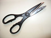 A pair of kitchen scissors.