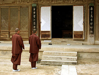 Monks in front of Daeungjeon Hall, Tongdosa Temple
