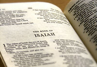 A Christian Bible, opened to the Book of Isaiah in the "Old Testament."