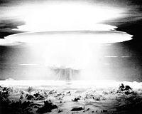 A black and white photograph of the Castle Bravo mushroom cloud.