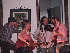 An American string band featuring banjo, fiddle, guitar, and washtub bass