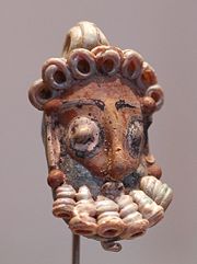 Punic pendant in the form of a bearded head, 4th-3rd century, BC