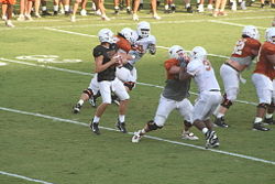 The forward pass distinguishes American football from rugby, its predecessor.