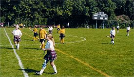 Women's field hockey, played on grass. Universal until the 1970s, this is now quite rare for competitive hockey in many countries
