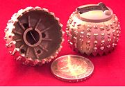 Replaceable IBM typeballs with clip, 2 Euro coin to compare