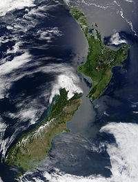 A satellite image of New Zealand. Lake Taupo and Mount Ruapehu are visible in the middle of North Island. The Southern Alps and the rain shadow they create are clearly visible on South Island.