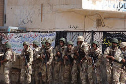 Iraqi National Guard soldiers prepare to enter the Al Askari Mosque on Oct. 1, 2004 after it had been seized by insurgents.