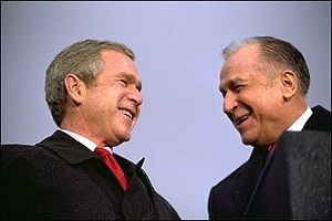 Iliescu, right, and U.S. President George W. Bush.