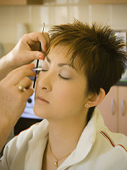 Application of eye shadow.