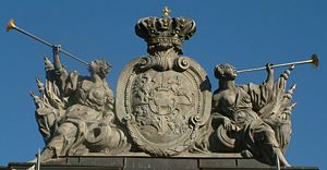 Polish-Lithuanian Commonwealth coat of arms. Ciołek i.e., Stanislaus II August coat of arms is placed in the middle of the shield. The sculpture is situated in Poznań.
