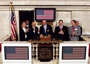 U.S. Secretary of Commerce Donald L. Evans rings the opening bell at the NYSE on April 23, 2003. Former chairman Richard Grasso is also in this picture.