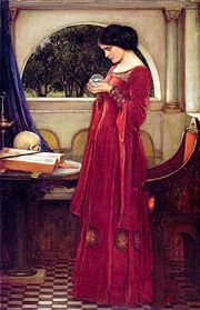"The Crystal Ball" by John William Waterhouse: using material for magical purposes; besides the crystal, a book and a wand.