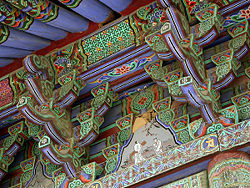 Ceiling painting detail with chrysanthemum pattern, Daeungjeon Hall.