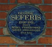 Blue plaque on Sloane Avenue, London.