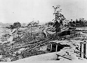 Palisades and chevaux-de-frise in front of the Potter House, Atlanta, Georgia, 1864