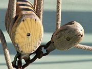 Pulleys on a ship. In this context, pulleys are usually known as blocks.