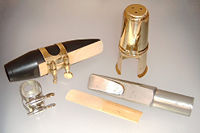 The mouthpiece of a tenor saxophone