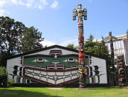 Wawadit'la, also known as Mungo Martin House, a Kwakwaka'wakw "big house," with heraldic pole. Built by Chief Mungo Martin in 1953. Located at Thunderbird Park in Victoria, British Columbia.