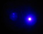Image of the violet light from a helium-cadmium metal vapor laser.
