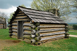 Restoration of a cabin in which Continental Army soldiers lived at Valley Forge.