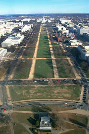 A view from the top of the Washington Monument. Looking east toward the Capitol, the dome can be seen. The Smithsonian is on the right.