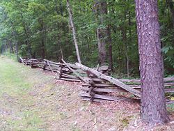 A split rail fence at the entrance to Sherando Lake