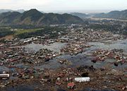 A village near the coast of Sumatra lies in ruin on January 2, 2005. a United States military helicopter crew from the USS Abraham Lincoln, conducting humanitarian operations, took this picture.