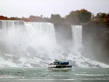 The American Falls and Bridal Veil Falls, with a Maid of the Mist tour boat in the foreground