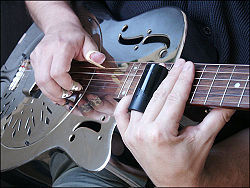 Resonator guitar played with a bottleneck